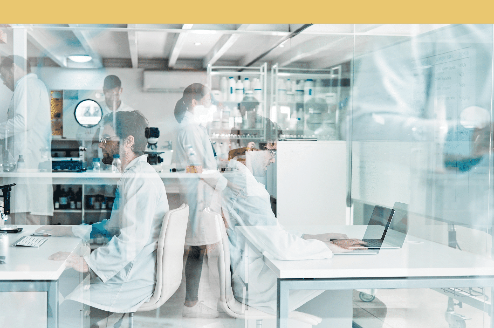 a man and woman in lab coats are working together